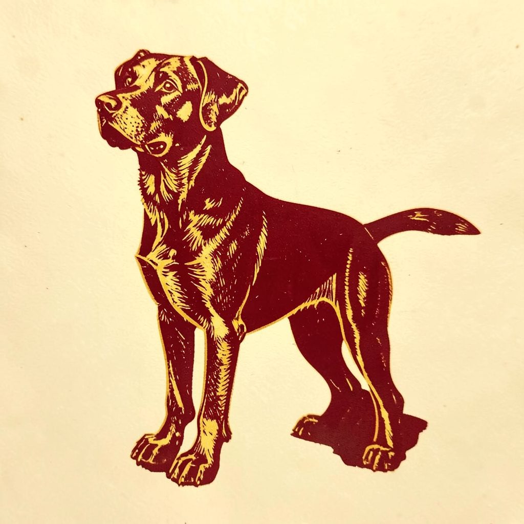 A carved linocut relief print of a dignified dog silhouette in deep burgundy and gold, set against a warm cream background, conveying a classic kennel club emblem feel.